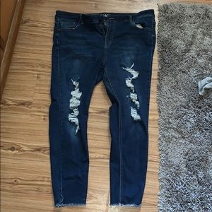 Dark ripped skinny jeans.